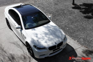 BMW M5 gloss black roof vinyl wrap